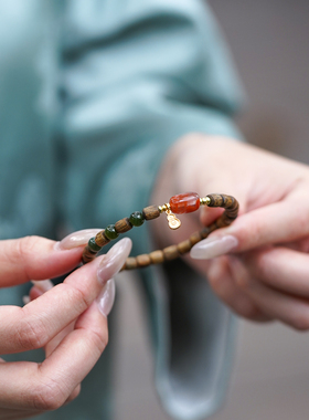 山川心语沉香南红奇楠软丝手串