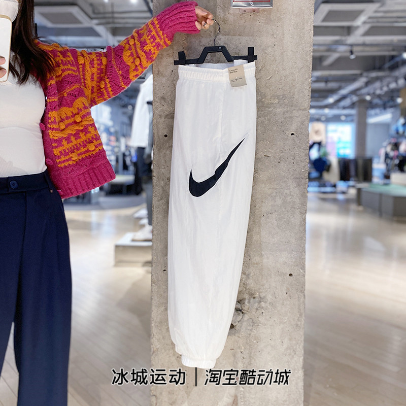 Nike耐克裤子女春季新款大勾梭织运动休闲收口长裤DM6184-536-010