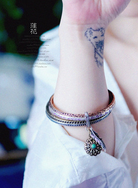 No.373 Lucky Brand 合金镀银真金彩绘扭纹宝石花盘流苏手镯套镯