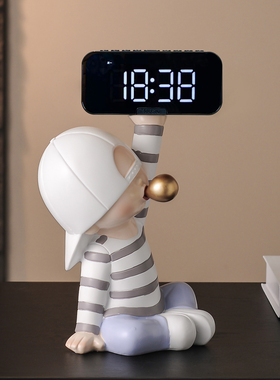 现代吹泡泡男孩闹钟摆件