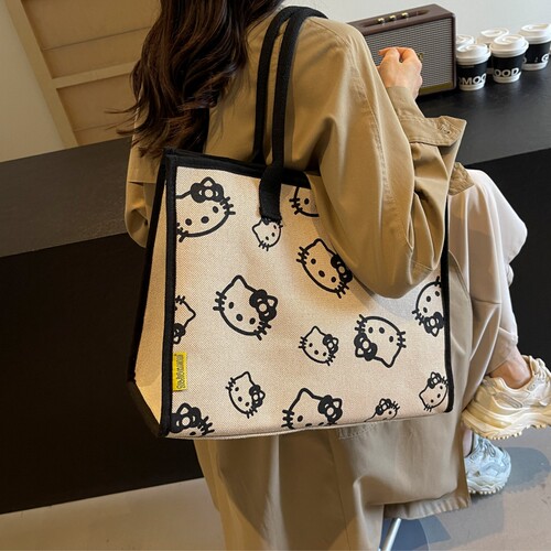 大容量包包女2026新款外出短途手提购物袋卡通帆布单肩通勤托特包 - 图1