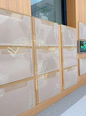 幼儿园阅读区收纳透明袋环创材料倾听墙面展示袋作品收纳布置装饰