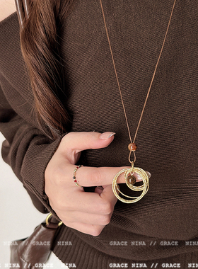 复古轻奢美拉德金属线缠绕虎眼石吊坠项链女长款毛衣链配饰高级感