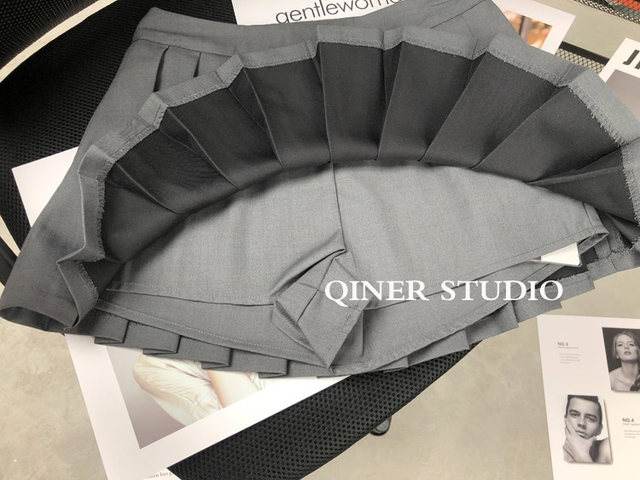 Short skirt pleated skirt European and American A-shaped anti-exposed