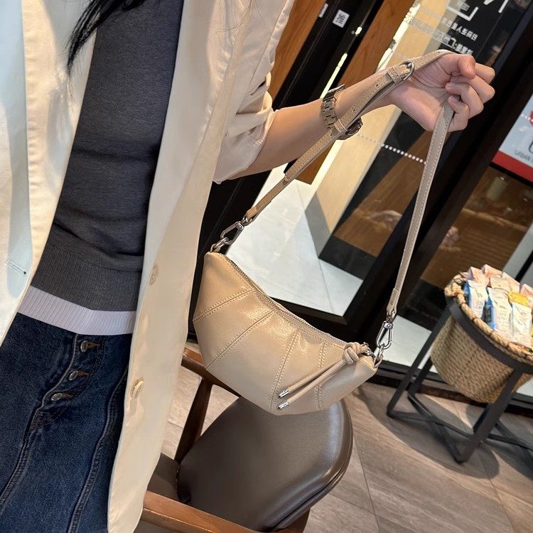 小包包女包2025新品夏真皮女包百搭牛皮小众单肩斜挎包牛角饺子包,淘宝优惠券,粉丝福利购,淘宝优惠卷