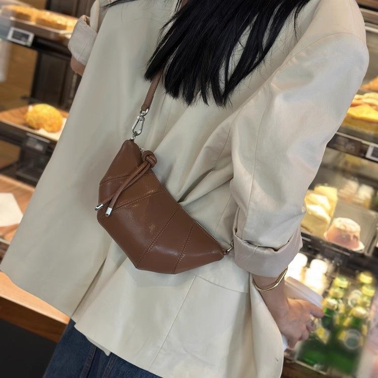 小包包女包2025新品夏真皮女包百搭牛皮小众单肩斜挎包牛角饺子包,淘宝优惠券,粉丝福利购,淘宝优惠卷