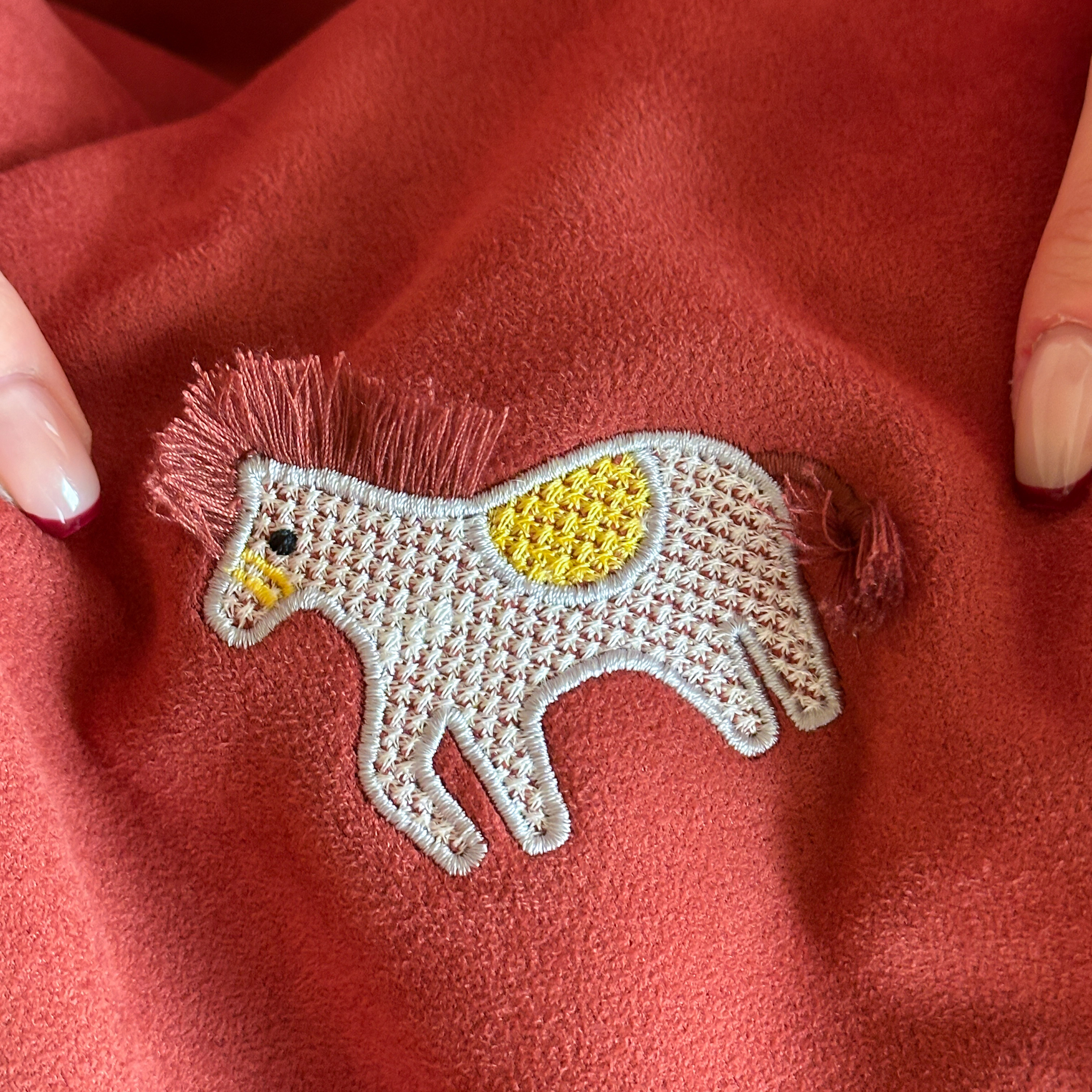 Year of the Horse red dual-purpose pillow that can be carried by hand and folded in the car