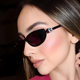 Punk-style cat-eye sunglasses with diamond letters and concave shape