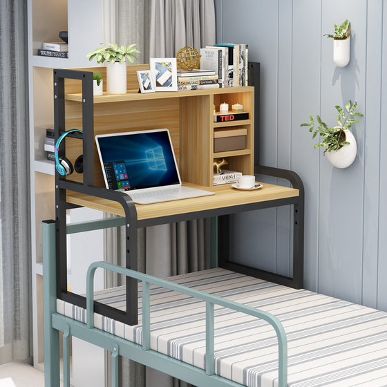 Extended desk on bed in college dormitory