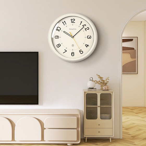 Simple and stylish home living room silent cream style wall clock