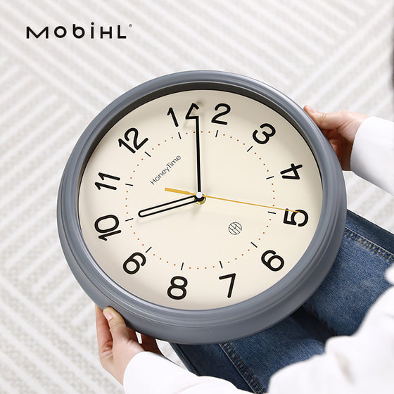 Simple and stylish home living room silent cream style wall clock