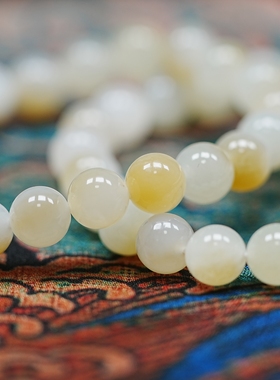 丝绸之路。新疆且末和田玉糖白玉8毫米圆珠手链 白度好 配证书