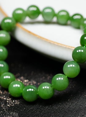 采桑子。天然老坑俄碧玉9.5毫米阳绿圆珠手链 微黑点