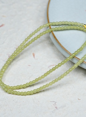 晓风初染嫩鹅黄。新疆若羌黄口料和田玉5乘4直切多圈手项链