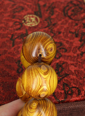 供应黄金木鬼脸对眼手串2