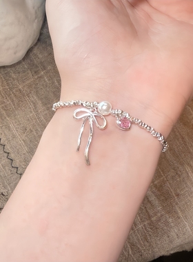 粉色爱心碎银子蝴蝶结手链女款