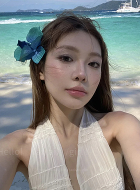 蓝色蝴蝶兰花朵发夹女海边拍照