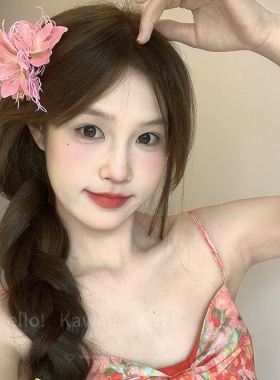 海边桔黄色茉莉藤蔓花朵发夹