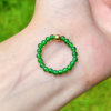 Natural high ice spicy green jadeite millet bead ring 999 pure gold gold women's new Chinese style national style
