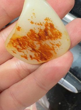 新疆和田玉籽料红油皮高脂粉