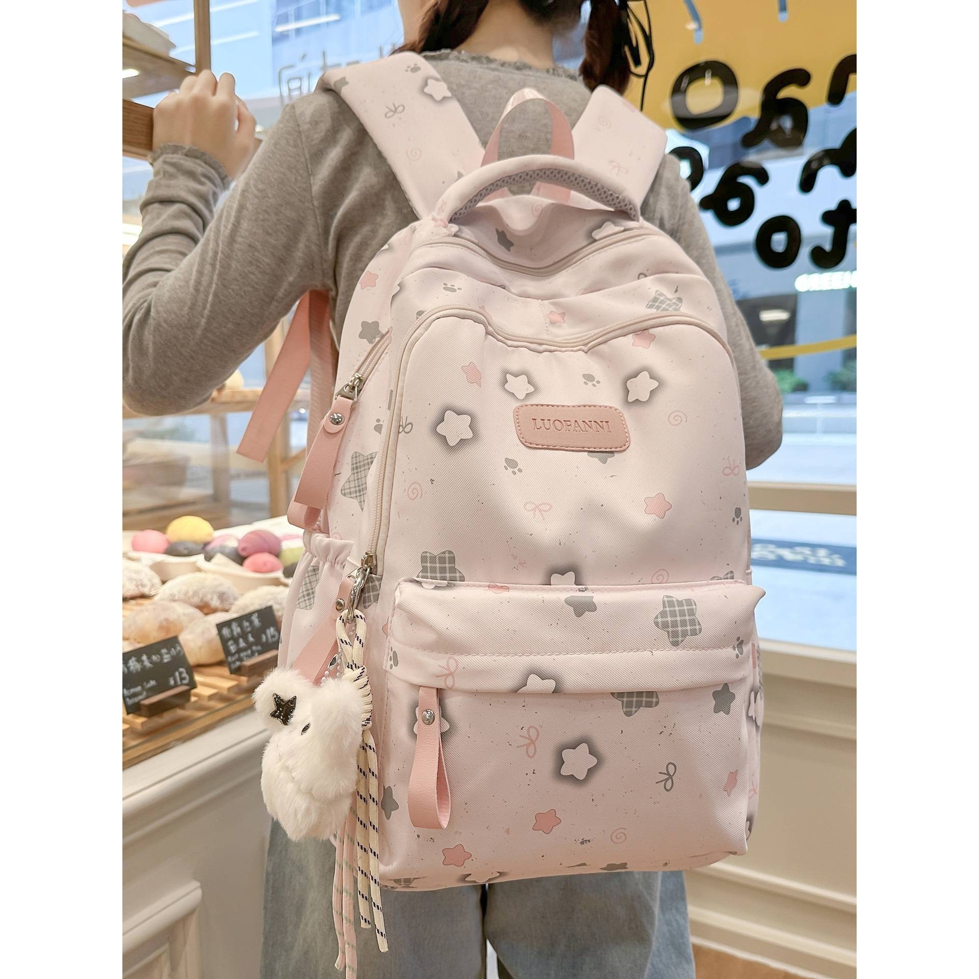 官方品牌大容量印花星星书包初中女三到六年级背包宽肩带大容量双,淘宝优惠券,粉丝福利购,淘宝优惠卷