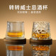 Rotating whiskey glass