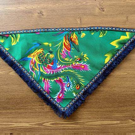 Square dance performance by tea-picking girls in ethnic headscarves