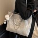 High-end one-shoulder niche design bag for women summer 2026 new style fashionable and versatile large-capacity commuter tote bag