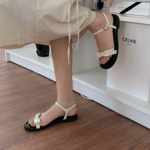 韩国东大门春夏新款显瘦时尚一字带蝴蝶结露趾百搭平底凉鞋女,淘宝优惠券,粉丝福利购,淘宝优惠卷