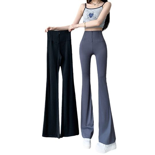 Les jambes minceantes et les pantalons de requin légèrement évasés pour les femmes portant 2025 Summer Style mince hanches et pantalon de yoga à corne de ventre de la taille haute