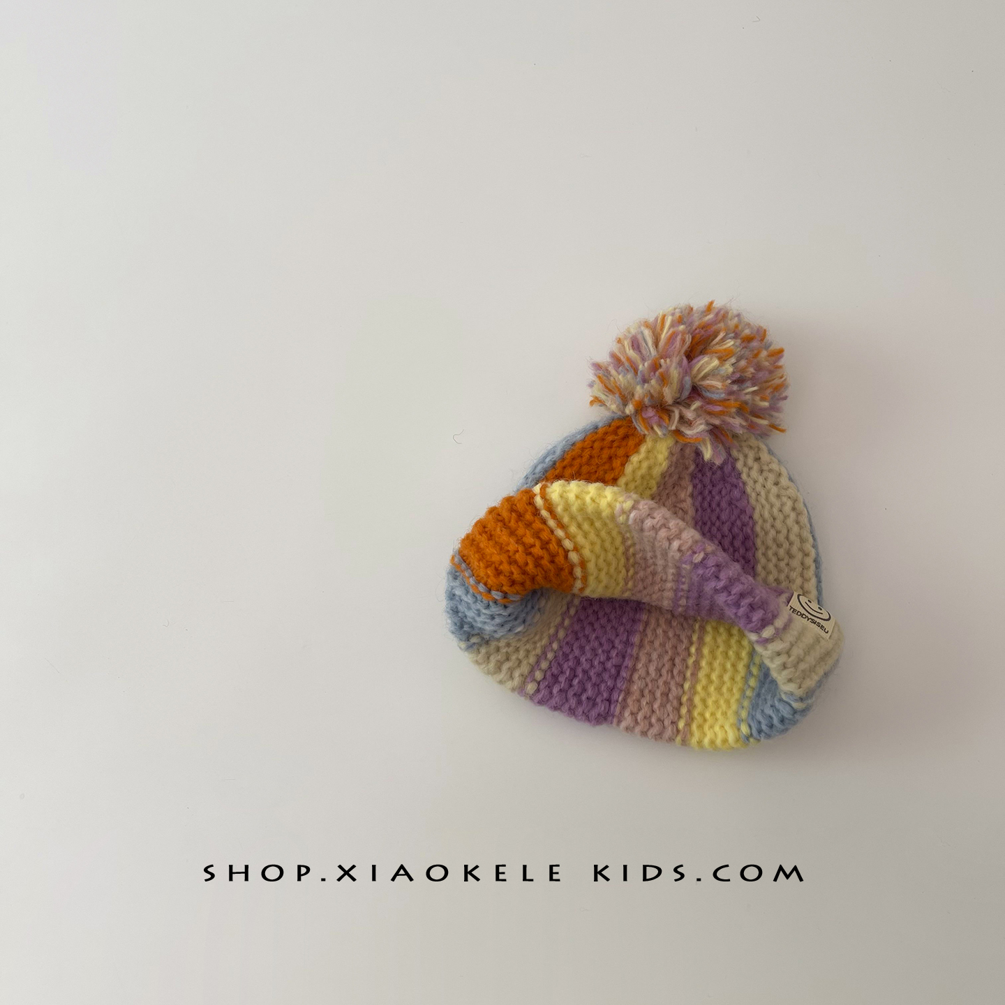 宝宝彩虹帽子男女童秋冬保暖防寒针织套头帽潮童时尚撞色毛球冷帽 - 图3