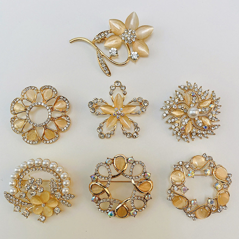 Korean high-end fashion rhinestone cat's eye orchid brooch corsage collar pin versatile clothing accessories scarf buckle wholesale