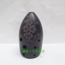 Fengs Tao-to-8-hole popularized version playing with an F-tone pure handmade black pottery with sculptures