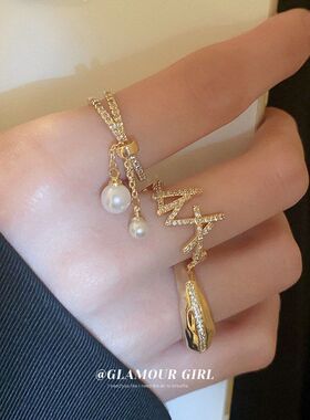 锆石交错电镀开口真金配饰流苏