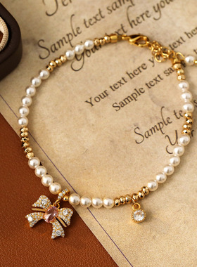 XKDDCT超仙粉色蝴蝶结锆石手链施