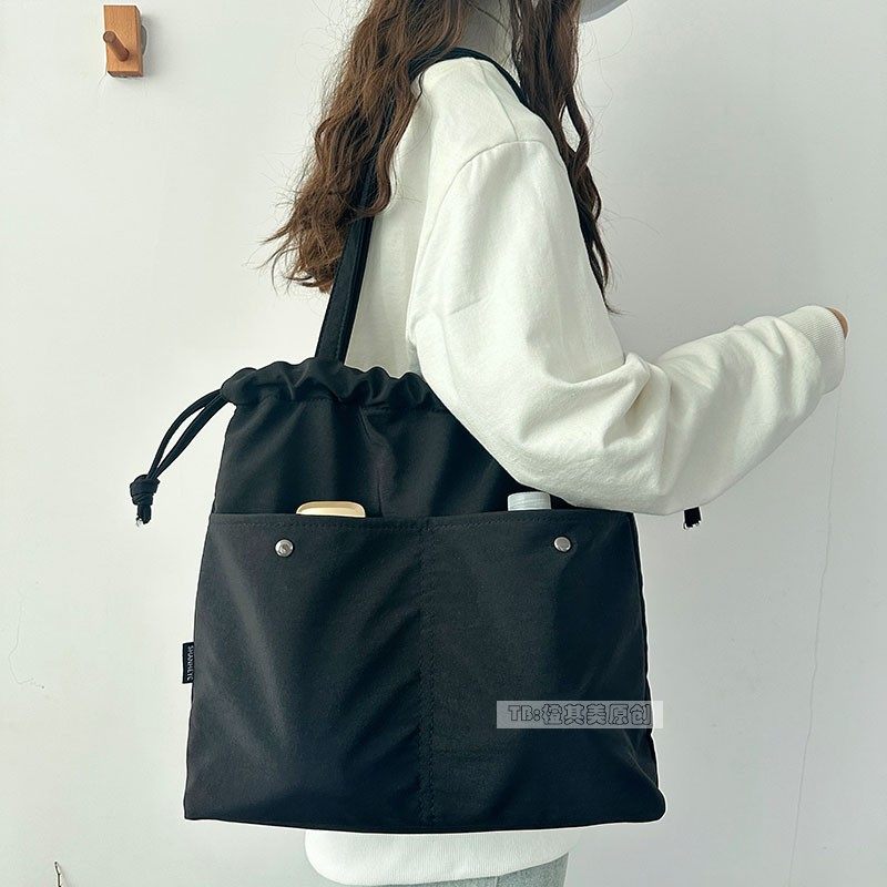 轻便防水尼龙布包包女秋冬2025新款抽绳单肩托特包通勤上学装书包,淘宝优惠券,粉丝福利购,淘宝优惠卷