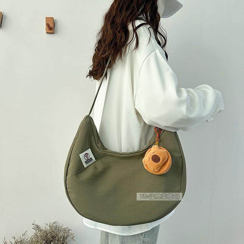 日系饺子包帆布包女时尚流行单肩包简约百搭通勤斜挎包上课书包袋,淘宝优惠券,粉丝福利购,淘宝优惠卷