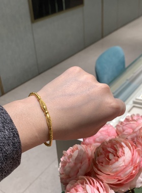 周大福传承系列双鱼戏珠黄金手链