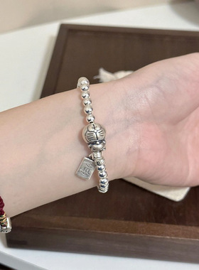 小红书爆款可爱哆啦A梦银珠手链女时尚轻奢叮当猫百宝袋手串珠子