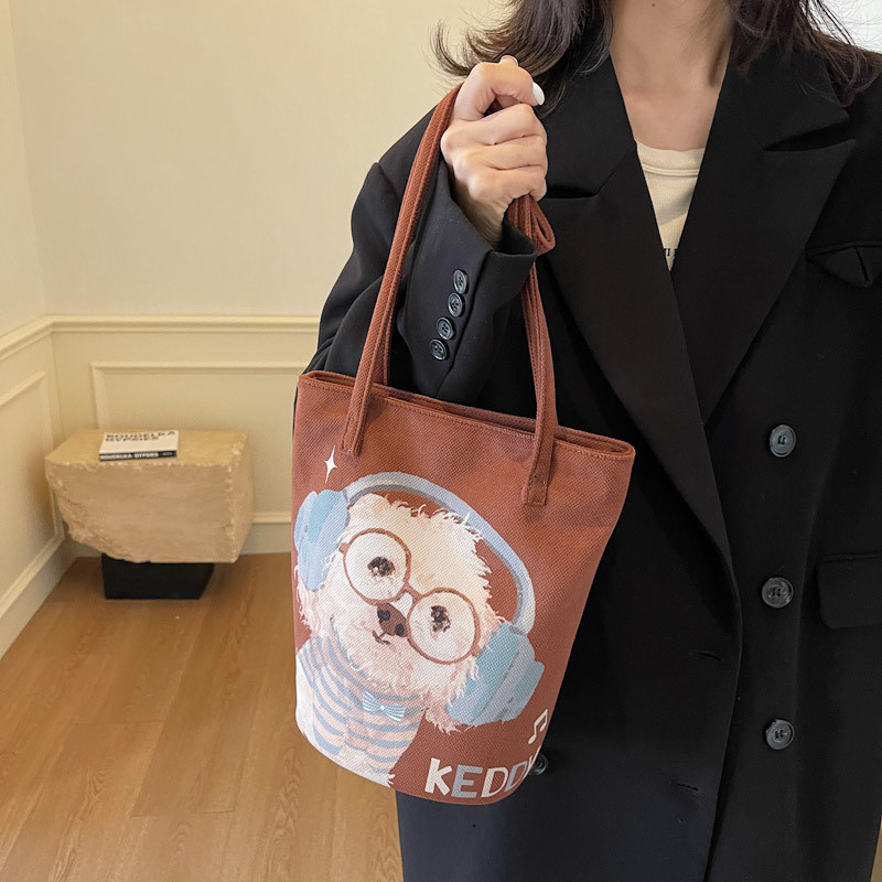 原创耳机小白布袋定制水桶包上班通勤设计感小众装书百搭手拎包,淘宝优惠券,粉丝福利购,淘宝优惠卷