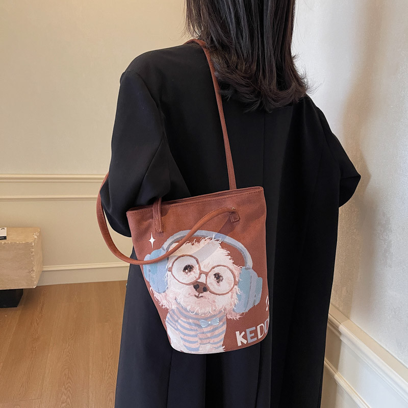 原创耳机小白布袋定制水桶包上班通勤设计感小众装书百搭手拎包,淘宝优惠券,粉丝福利购,淘宝优惠卷