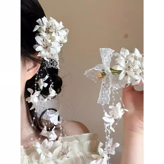 超仙仿真铃兰花流苏发夹女2025新款氛围感拍照侧边夹森系头花发饰