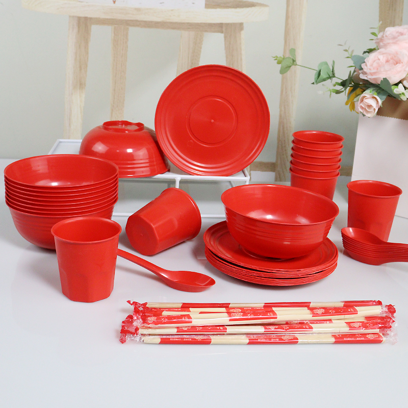 Red disposable festive wedding banquet bowls, cups, chopsticks tableware