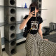 ສະ​ຖາ​ນີ​ເອີ​ຣົບ​ແຂນ​ສັ້ນ​ກະ​ທັດ​ຮັດ​ເສື້ອ​ທີ​ເຊີດ​ຂອງ​ແມ່​ຍິງ Summer ອາ​ເມລິ​ກາ Retro