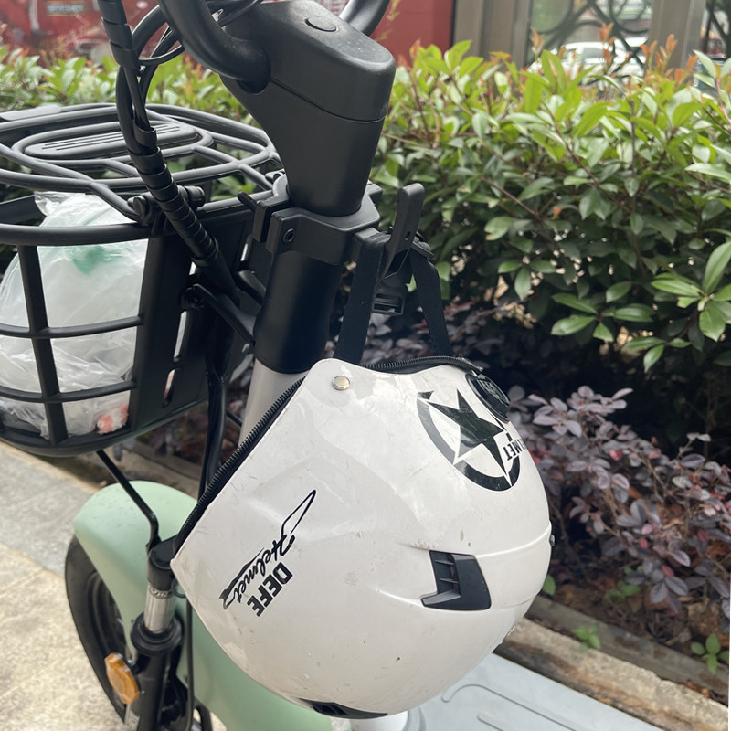 The thick pole can be hooked to the front of the electric vehicle and drilled