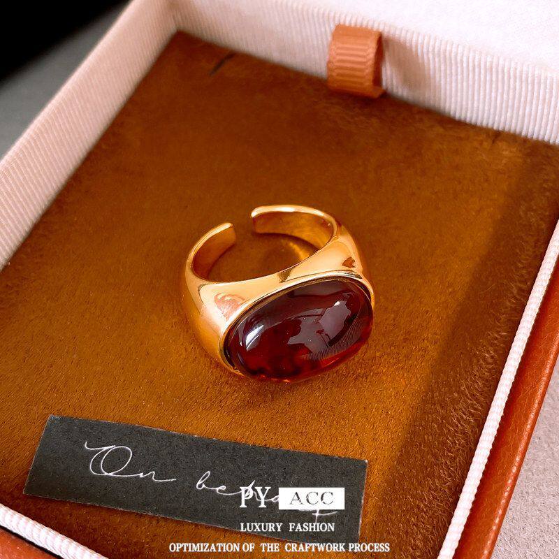 Oval ring with elegant electroplated jade resin opening