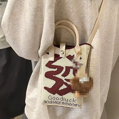 新款卡通女针织可爱手机包女斜跨手拎小巧便携单肩手提包外出包包