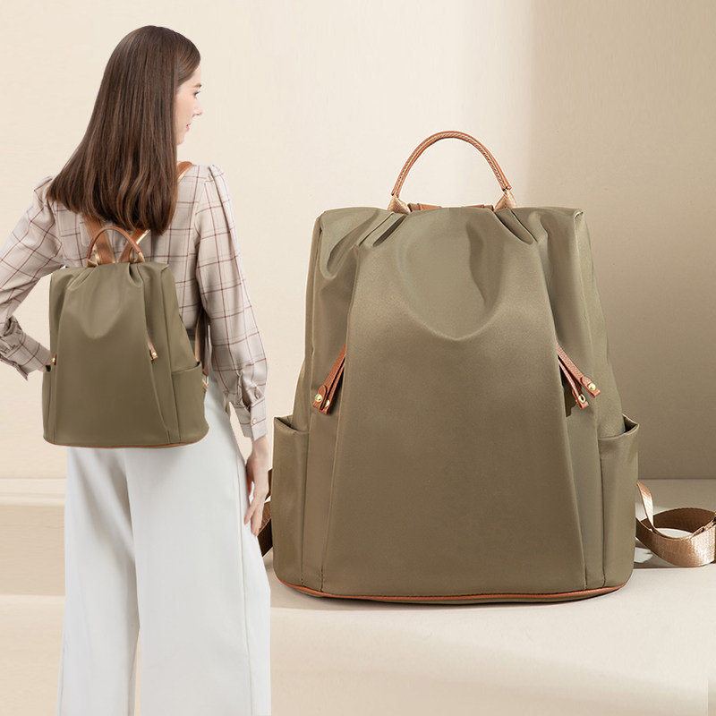 新款防水双肩包女2025新款通勤旅游背包高颜值时尚轻便大容量书包,淘宝优惠券,粉丝福利购,淘宝优惠卷