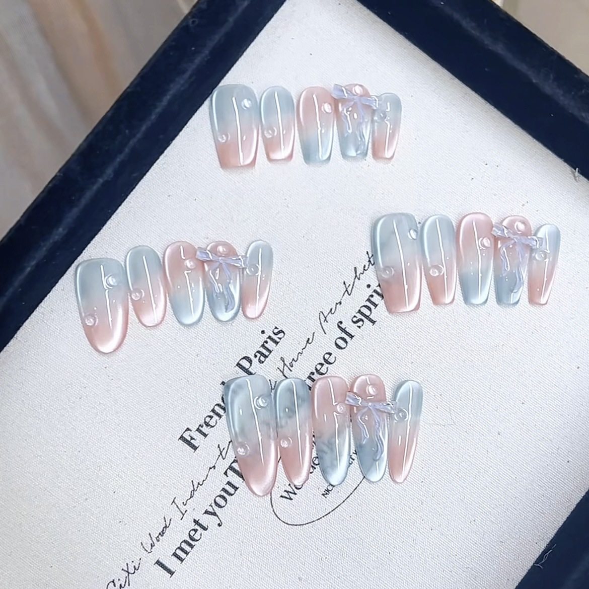 清冷气质感冰透浅粉蓝追光猫眼渐变透明水珠立体飘带蝴蝶结美甲,淘宝优惠券,粉丝福利购,淘宝优惠卷