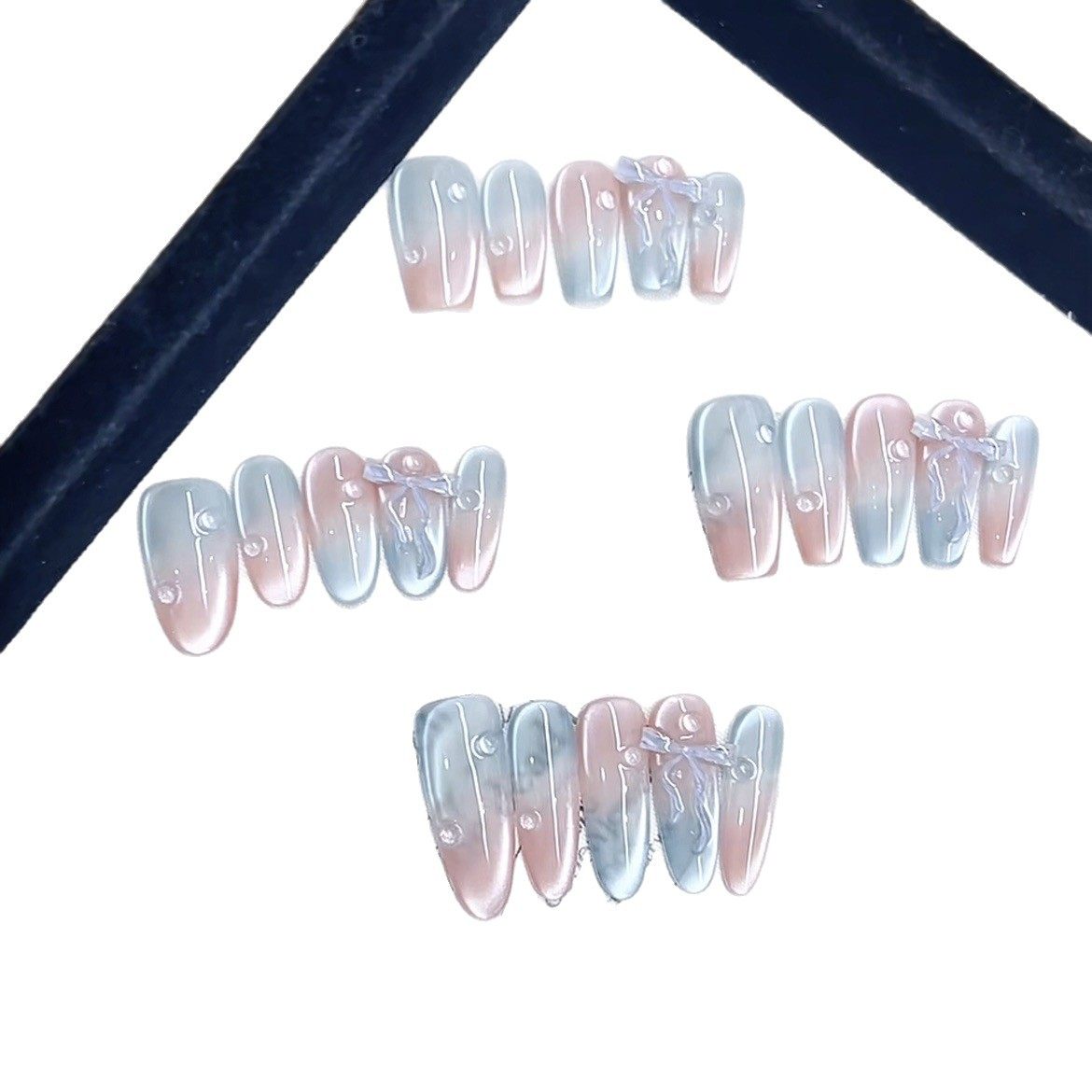 清冷气质感冰透浅粉蓝追光猫眼渐变透明水珠立体飘带蝴蝶结美甲,淘宝优惠券,粉丝福利购,淘宝优惠卷